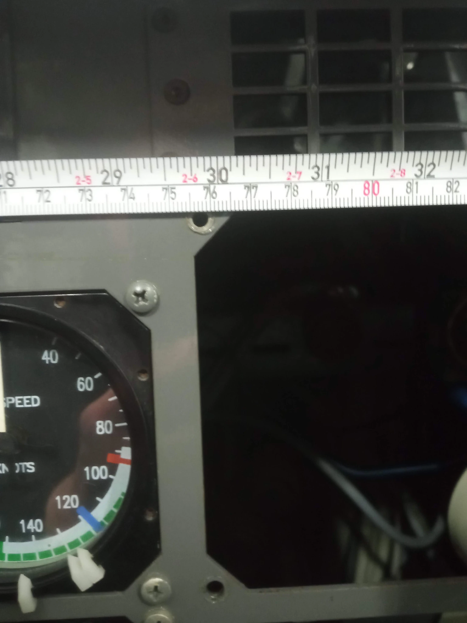 Physical reference measurement across an existing instrument panel opening