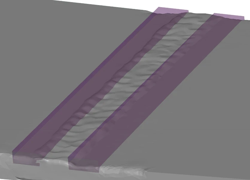 Highlighted volume refinement zones running along both sides of the weld seam